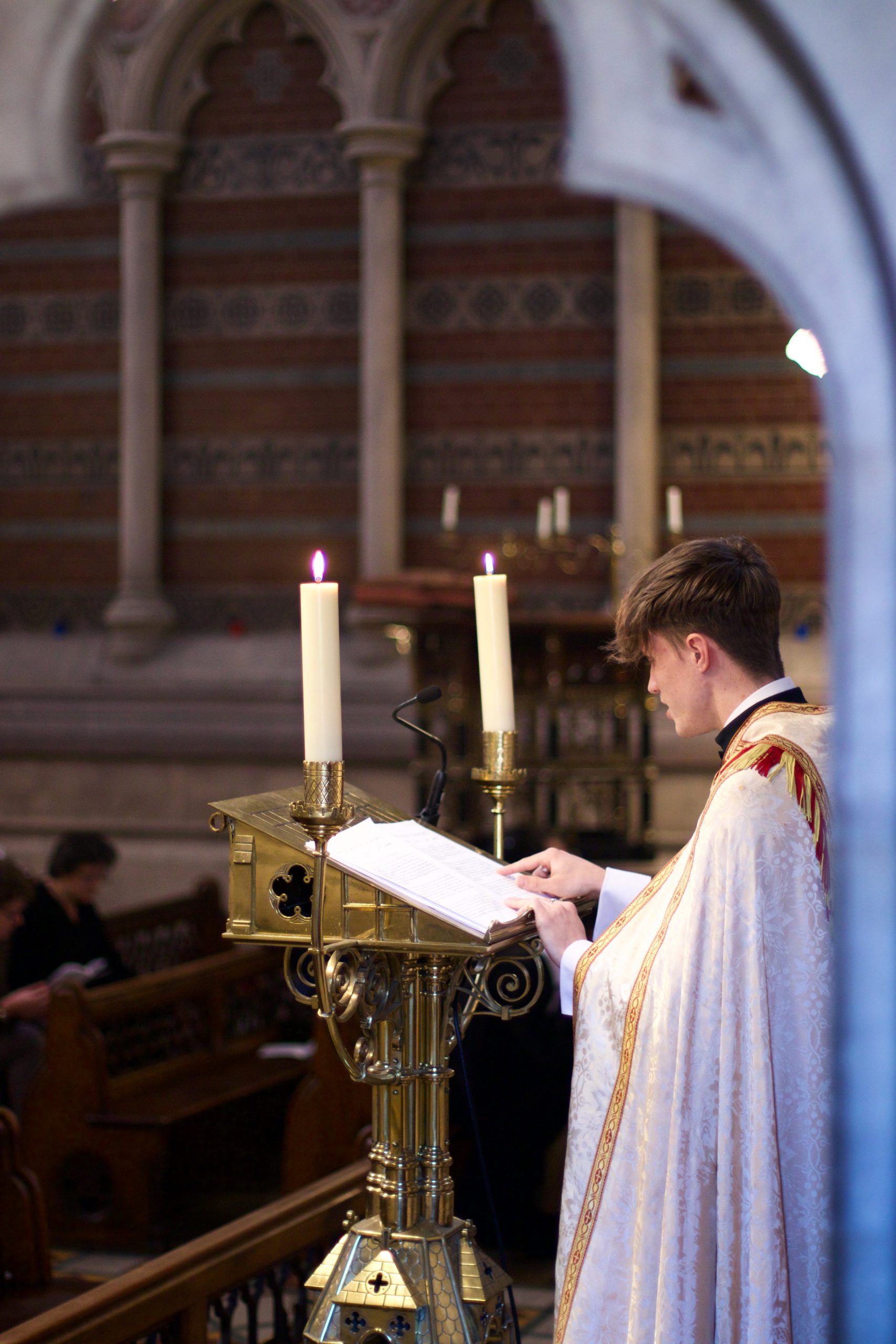 Singer at lectern